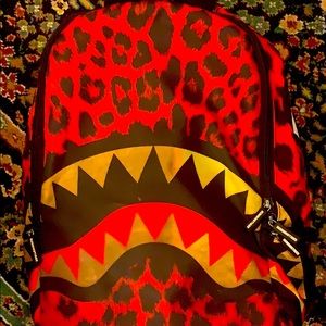 I am selling an Red bape book bag for kids-adults